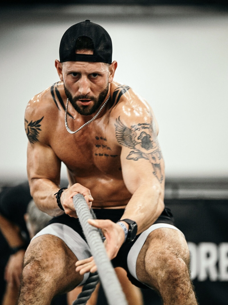 Athlete training with barbell